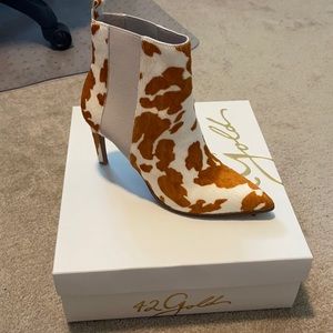 Cow print booties
